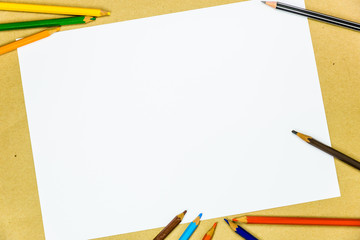 White paper copy space with color pencils for background use