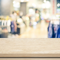 Empty table and blurred store with bokeh background