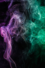 Abstract purple emerald smoke from aromatic sticks.