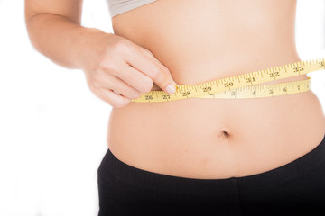 Woman checking her belly need to loss weight

