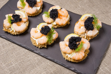 Shrimp Appetizer served on toasted bread