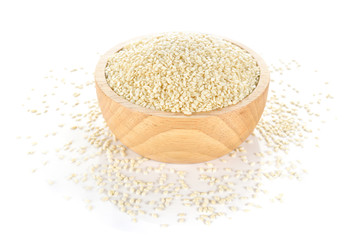white sesame in wooden bowl on white background