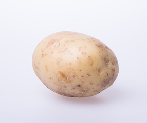 potato or organic potato on a background.