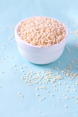 sesame seeds on wooden surface