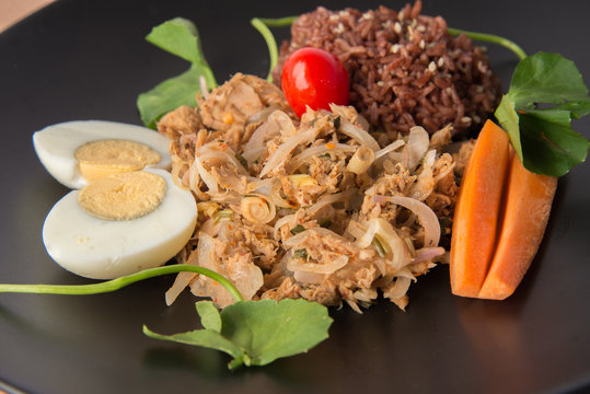 Spicy Tuna salad with brown healthy rice and boiled egg clean food