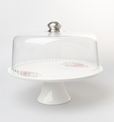 cake stand or glass cake tray on a backgeound.