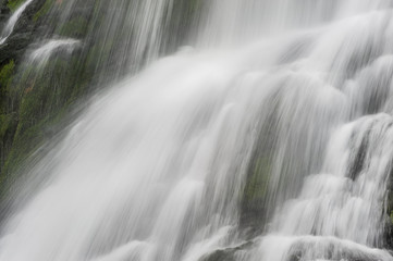Fototapeta na wymiar Nature background with waterfall