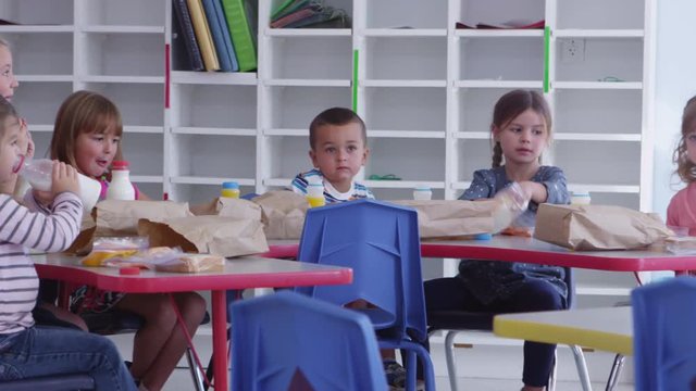 Children eating lunch at pre-school - 4K