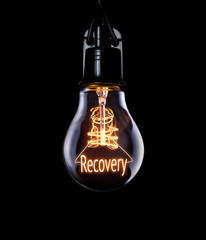 Hanging lightbulb with glowing Recovery concept.