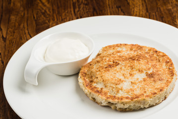Hash brown with sour cream