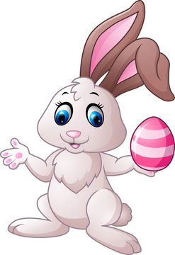 Little bunny holding easter egg