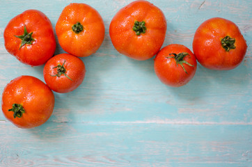 Tomatoes are laid on the table.