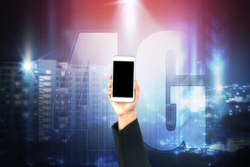 Business hand holding smart phone on technology background