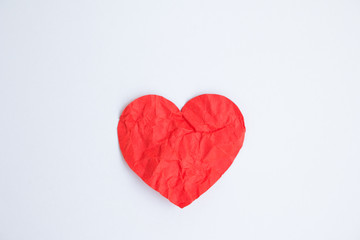 Crumpled red paper heart