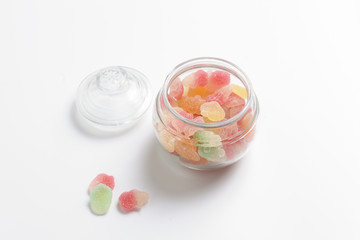 colourful mashmallows in the glass bottle