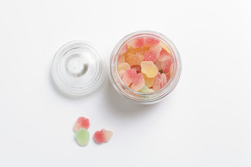 colourful mashmallows in the glass bottle