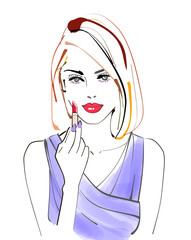 リップメイクする女性