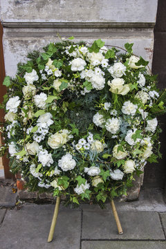 Funeral wreath with carnations and roses