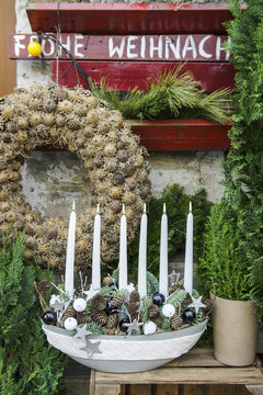 Christmas table decoration with white candles