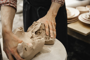 Potter master preparing the clay