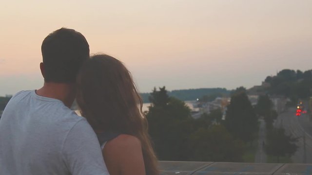 Urban couple enjoying in the city view.