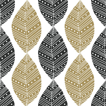 Bohemian eamless pattern with black and gold ethnic leaves. Vector textile swatch or packaging design. Tribal design