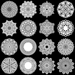 Large  set of design elements, lace round paper doily, doily to decorate the cake, template for cutting, greeting element,  snowflake, laser cut;  vector illustrations