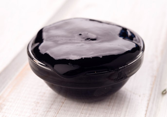 squid ink pasta concentrated in glass bowl