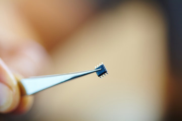 microchip with tweezers