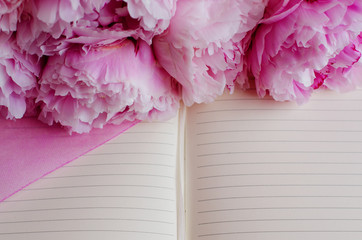 The empty form for records. Female diary. Outdoor notebook decorated with pink flowers
