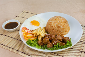  Beef Lok Lak with fried egg, steamed rice and fresh vegetables