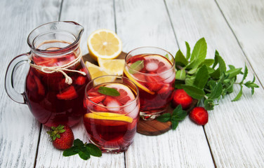 Glasses of lemonade with strawberries