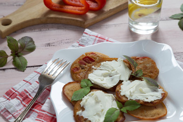 Pancakes with paprika and cream cheese