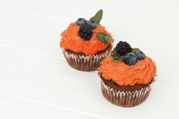 Picture of creamy cake with blueberries and mint