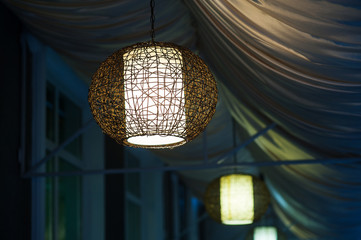included chandeliers in the evening cafe outdoor