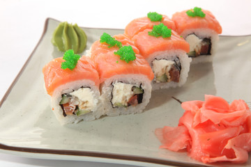 Japanese roll with wasabi sauce on plate