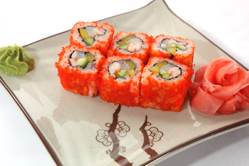 Japanese roll with wasabi sauce on plate