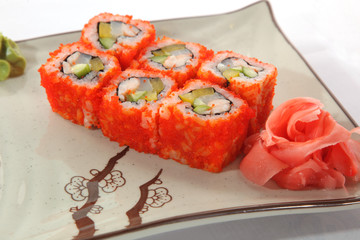 Japanese roll with wasabi sauce on plate