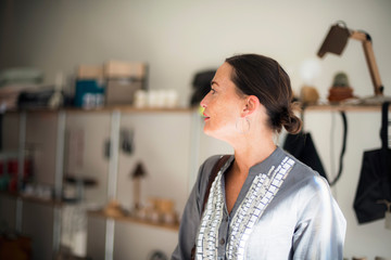 Brunette woman inside store