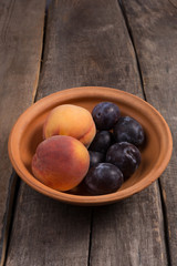 Ripe fruit in a ceramic plate