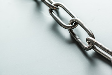 Fototapeta premium close up of metal chain part on white background