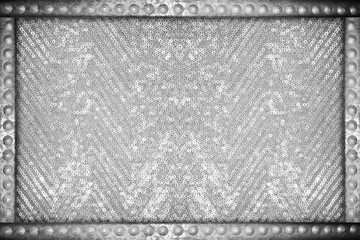 Silver sparkle glittering background with metal rivets frame