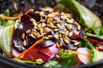 salad of roasted beets, vegetables with pine nuts