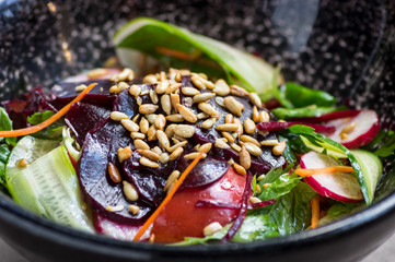 salad of roasted beets, vegetables with pine nuts