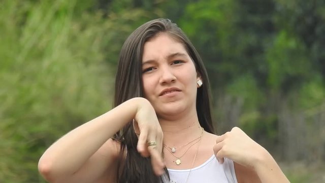 Girl Bothered By Flying Insects Or Mosquitoes