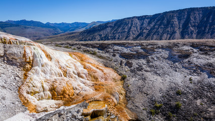 Amazing landscape of geothermal activity. Vivid stream at Mammoth Hot Springs, Yellowstone National Park, Wyoming, USA