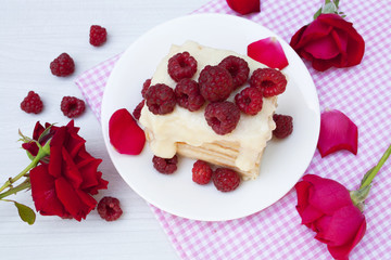 delicious slice of cake and roses