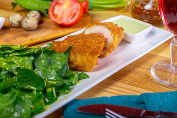 Breaded cutlet served on a plate