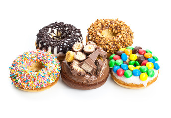 Delicious donuts with icing isolated on white