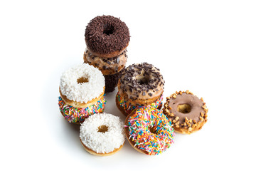 various donuts on white background